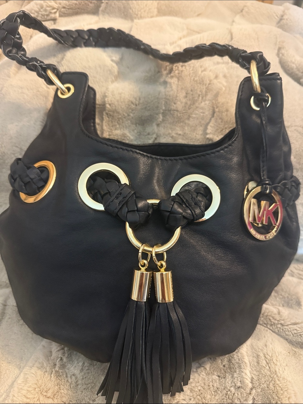 Michael Kors Black Leather Shoulder Bag with Gold Hardware and Tassels